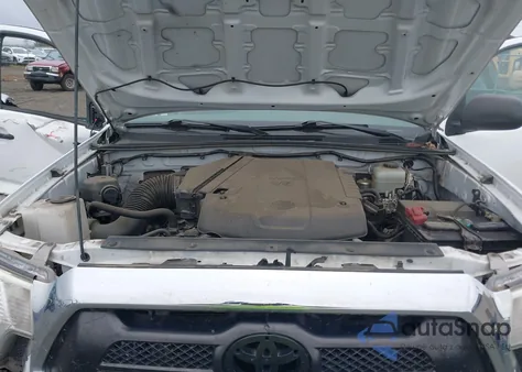 2015 Toyota Tacoma Base V6 z USA, uszkodzony, nr VIN 3TMLU4EN8FM206394